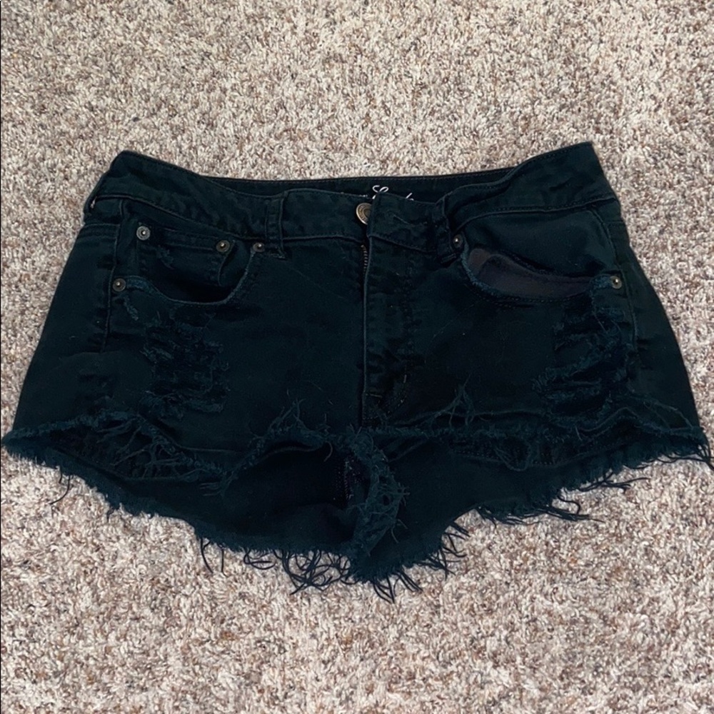 black distressed american eagle shorts